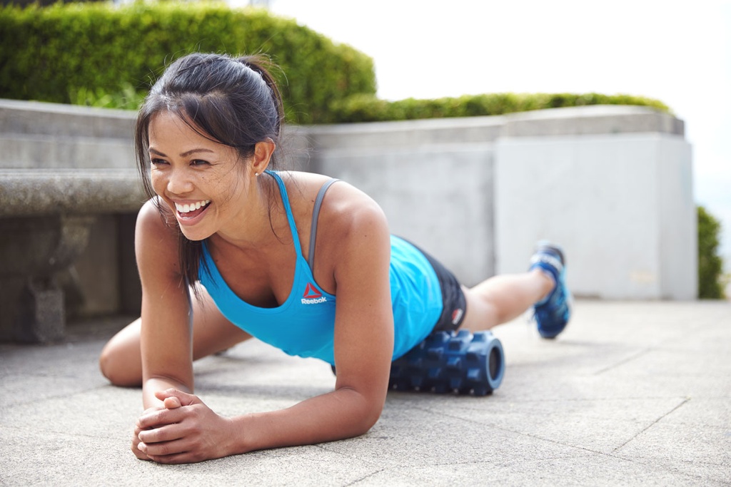 runner_woman_with_rr_on_quad_smiling.jpg